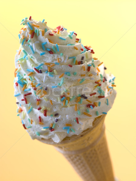 Stock photo: Whipped Ice Cream Cone with Candy Sprinkles