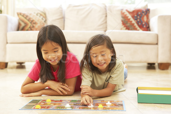 Stockfoto: Twee · kinderen · spelen · bordspel · home · portret