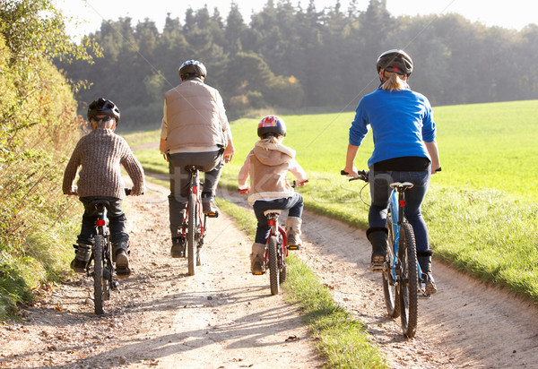 Foto d'archivio: Giovani · genitori · bambini · bikes · parco · divertimento