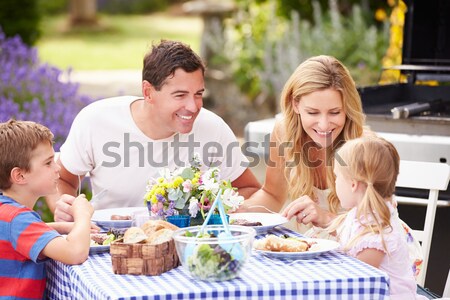 Stockfoto: Familie · vakantie · eten · buitenshuis · vrouw · huis