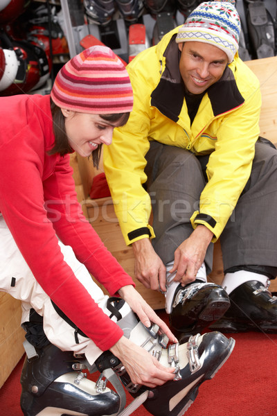 Couple On Trying On Ski Boots In Hire Shop Stock photo © monkey_business