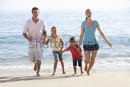 Family Having Fun On Beach Holiday Stock photo © monkey_business