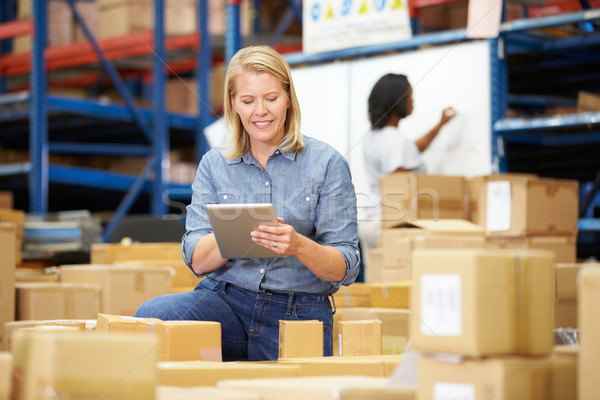 Workers In Warehouse Preparing Goods For Dispatch Stock photo © monkey_business