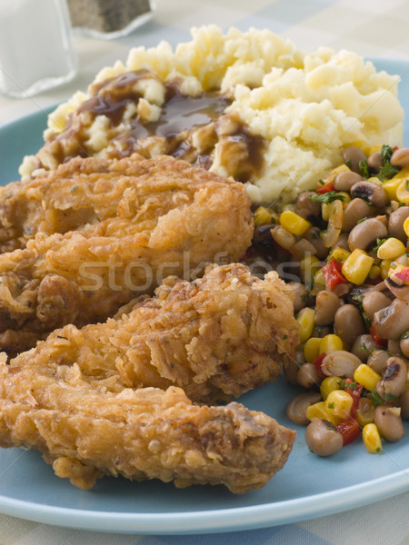 Southern Fried Chicken Wings with Mash Potato Beans and Gravy Stock photo © monkey_business