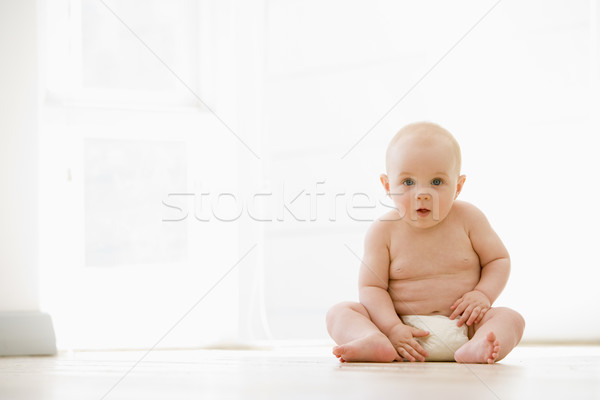 Baby sitting indoors Stock photo © monkey_business