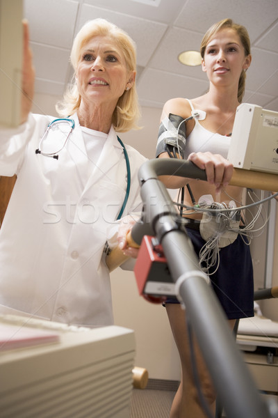 Doctor Monitoring The Heart-Rate Of Patient On A Treadmill Stock photo © monkey_business