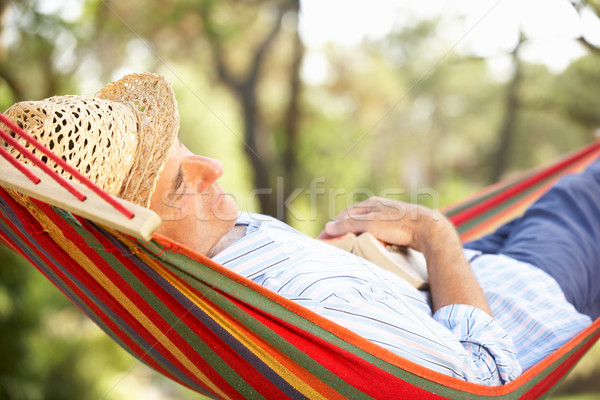 Stock photo: Senior Man Relaxing In Hammock