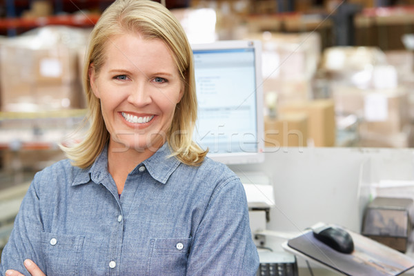 Woman At Computer Terminal In Distribution Warehouse Stock photo © monkey_business