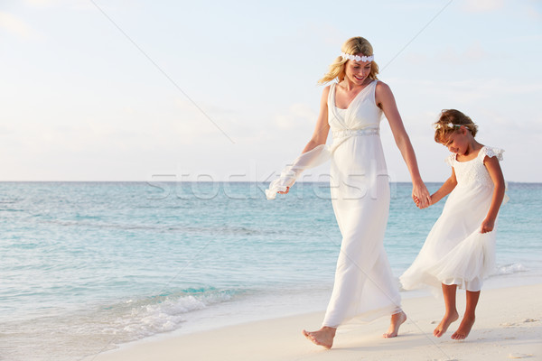 Bride With Bridesmaid At Beautiful Beach Wedding Stock photo © monkey_business