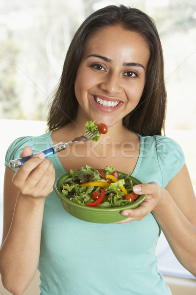 Tinilány eszik saláta nő lány étel Stock fotó © monkey_business
