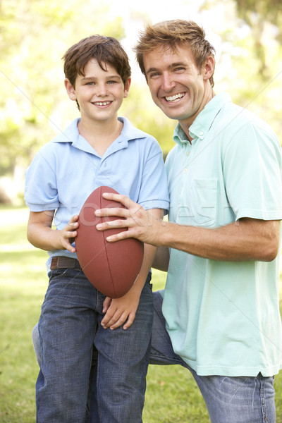 Apa fia játszik amerikai futball együtt férfi Stock fotó © monkey_business