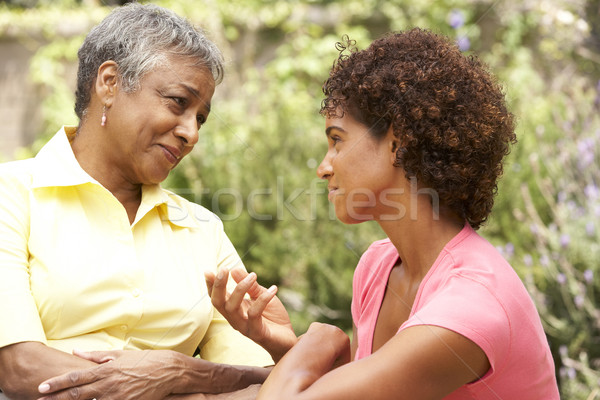 Senior Woman Being Consoled By Adult Daughter Stock photo © monkey_business