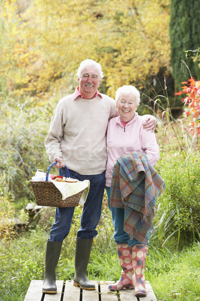 Couple de personnes âgées extérieur panier pique-nique automne homme bois [[stock_photo]] © monkey_business