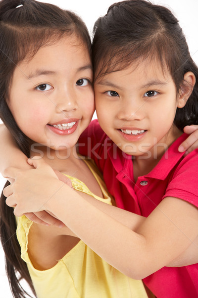 Studio Shot Of Two Chinese Girls Stock photo © monkey_business