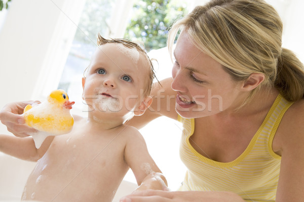Anya baba habfürdő mosolyog nő gyermek Stock fotó © monkey_business