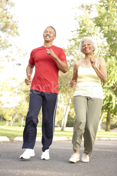 Couple de personnes âgées jogging parc homme heureux couple Photo stock © monkey_business