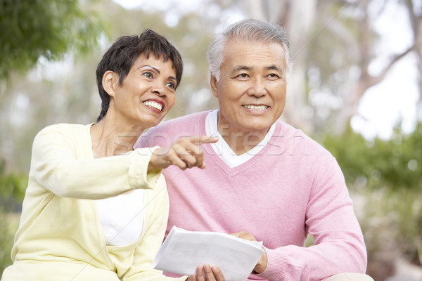 Stock photo: Portrait Of Senior Couple Looking At Map