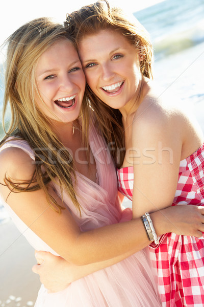 Two Teenage Girls Enjoying Beach Holiday Together Stock photo © monkey_business