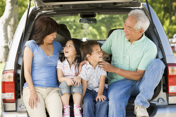 Grandparents with grandkids in tailgate of car Stock photo © monkey_business