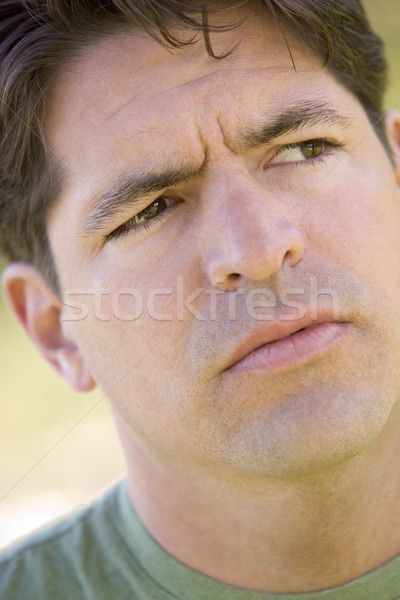Head shot of man scowling Stock photo © monkey_business