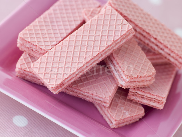 Rózsaszín ostya kekszek gyerekek tányér krém Stock fotó © monkey_business