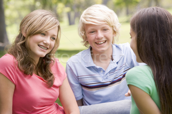 Adolescentes sesión feliz amigos ninas adolescente Foto stock © monkey_business