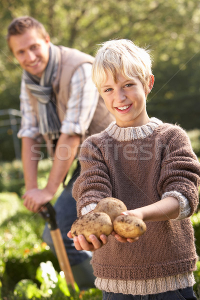 Jeune homme enfant travail jardin homme garçon [[stock_photo]] © monkey_business