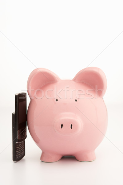 Piggybank and cellphone Stock photo © monkey_business
