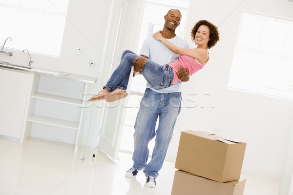 Férj tart feleség új otthon mosolyog ház Stock fotó © monkey_business