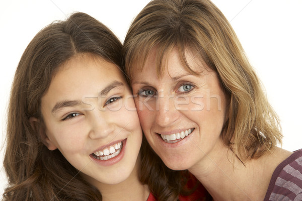Stock photo: Studio Portrait Of Mother And Daughter