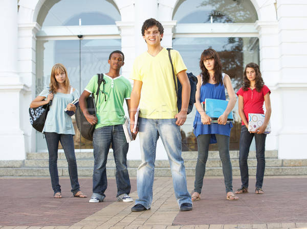 Group Of Teenage Students Standing Outside College Building Stock photo © monkey_business