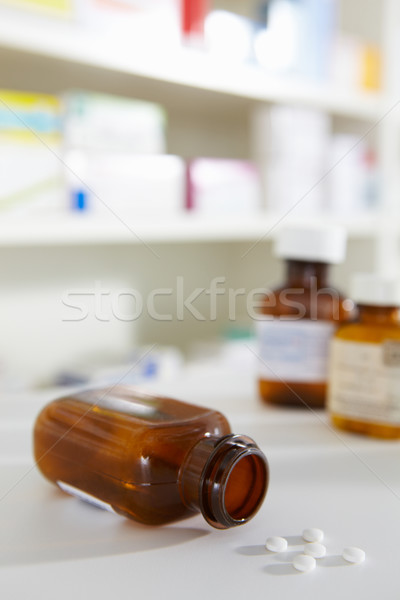 Prescription pill bottles on pharmacy shelf Stock photo © monkey_business
