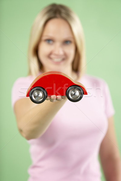 Woman Holding Toy Car Stock photo © monkey_business