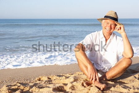 Zdjęcia stock: Młody · człowiek · relaks · plaża · piaszczysta · człowiek · morza · lata