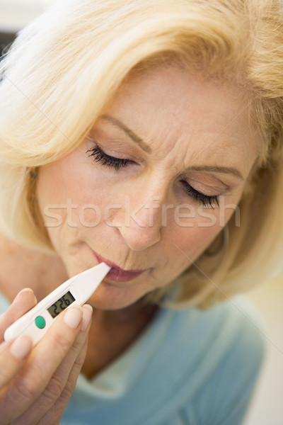 Frau Aufnahme Temperatur Thermometer Gesundheit krank Stock foto © monkey_business