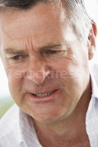 Középkorú férfi arc portré személy idős érzelem Stock fotó © monkey_business