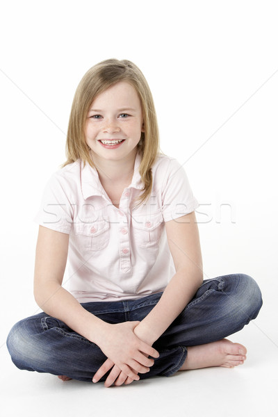 Jeune fille séance studio fille enfants heureux Photo stock © monkey_business