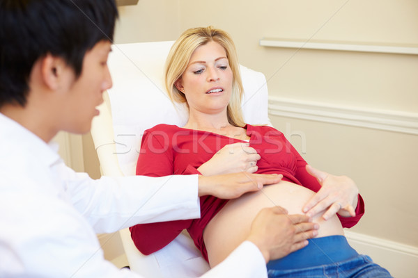 Pregnant Woman Being Given Ante Natal Check By Doctor Stock photo © monkey_business