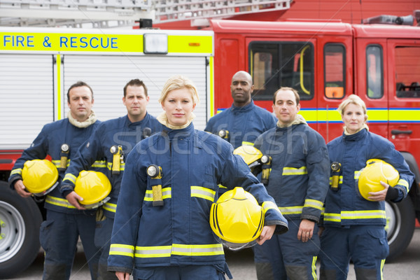 Portrait of a group of firefighters by a fire engine Stock photo © monkey_business