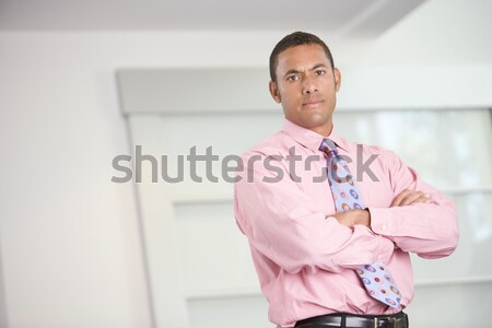 üzletember áll bent mosolyog üzlet férfi Stock fotó © monkey_business