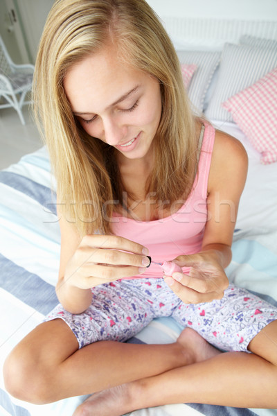 Teenage girl painting nails Stock photo © monkey_business