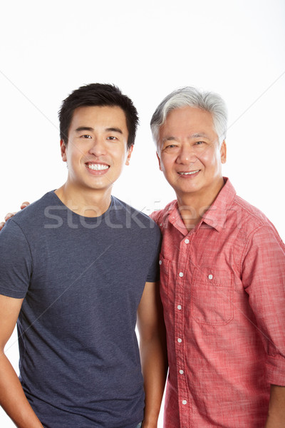 Studio Portrait Of Chinese Father With Adult Son Stock photo © monkey_business