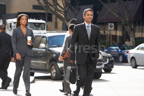 Group Of Businesspeople Crossing Street Stock photo © monkey_business