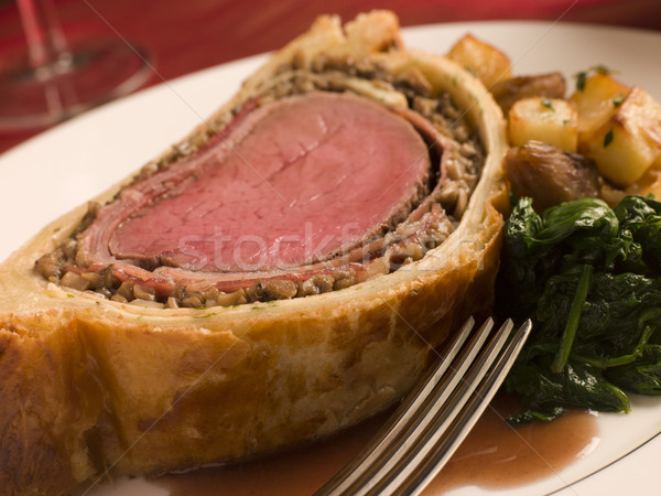 Slice of Beef Wellington with Spinach and Saut ed Potatoes Stock photo © monkey_business