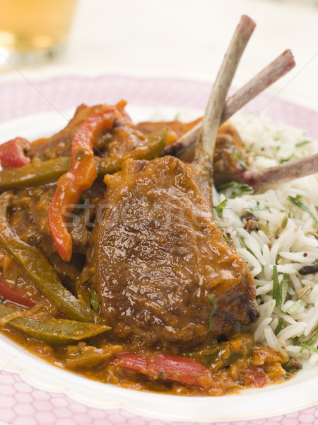 Lamb Cutlet Jalfrezi with Fragrant Pilau and Indian Beer Stock photo © monkey_business