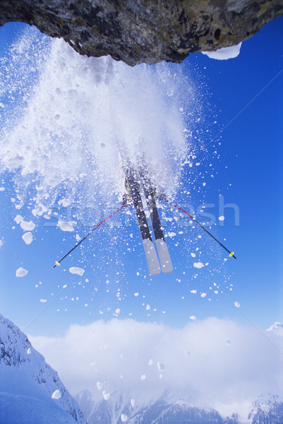 Narciarz skoki śniegu Błękitne niebo wakacje wakacje Zdjęcia stock © monkey_business