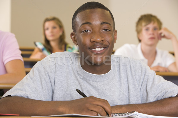 Male college student in a university lecture hall Stock photo © monkey_business