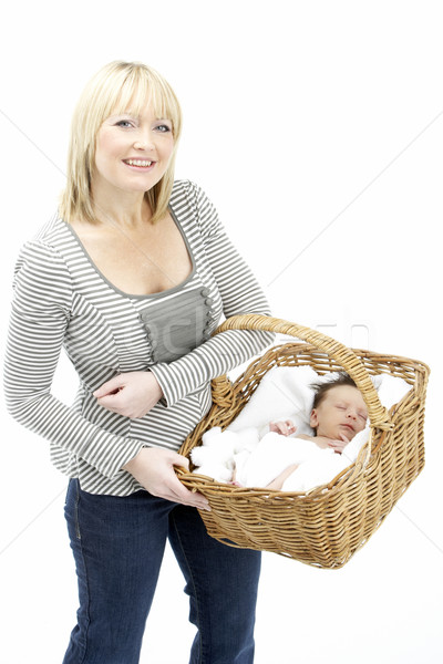 Newborn Baby Held In Basket By Mother Stock photo © monkey_business