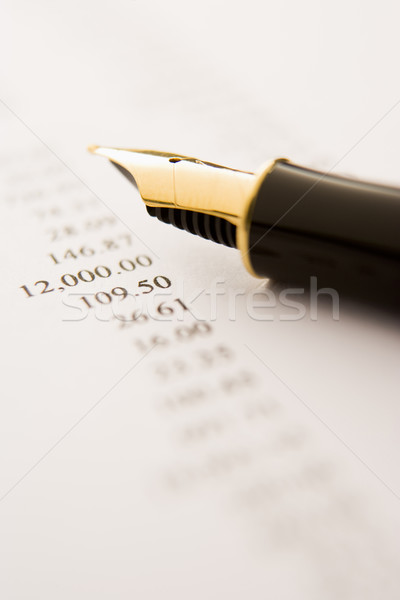 Arany töltőtoll számla papír toll pénzügy Stock fotó © monkey_business