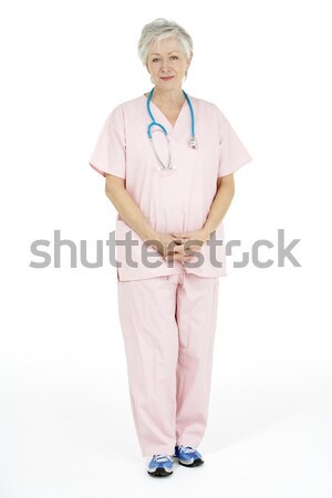 Stock photo: Studio Portrait Of Senior Nurse